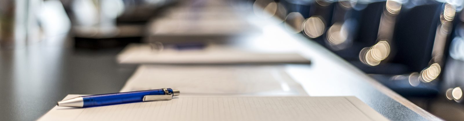 Papers on conference table