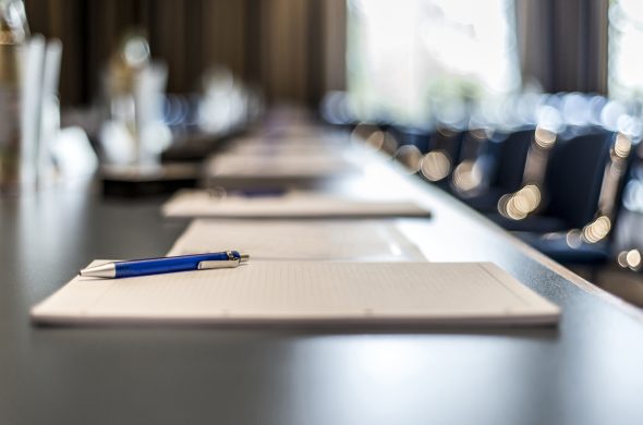 Papers on conference table